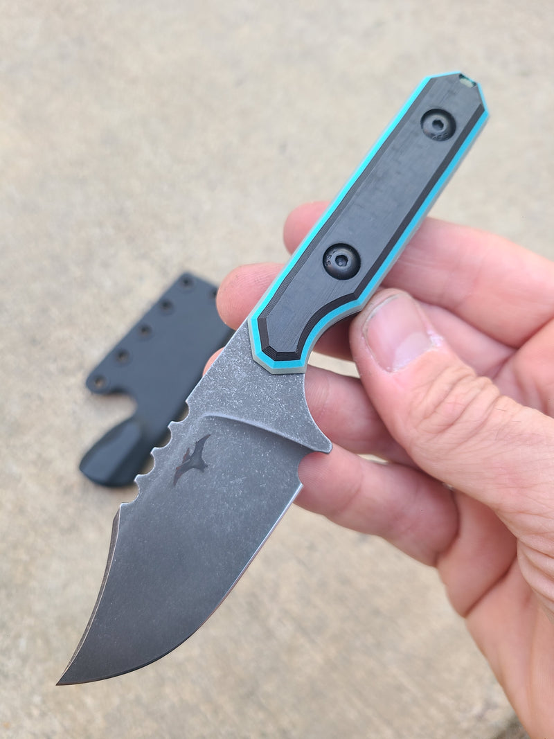 Load image into Gallery viewer, 52100 Mid-Sized Bowie (Carbon Fiber w/ Turquoise Blue Glow)
