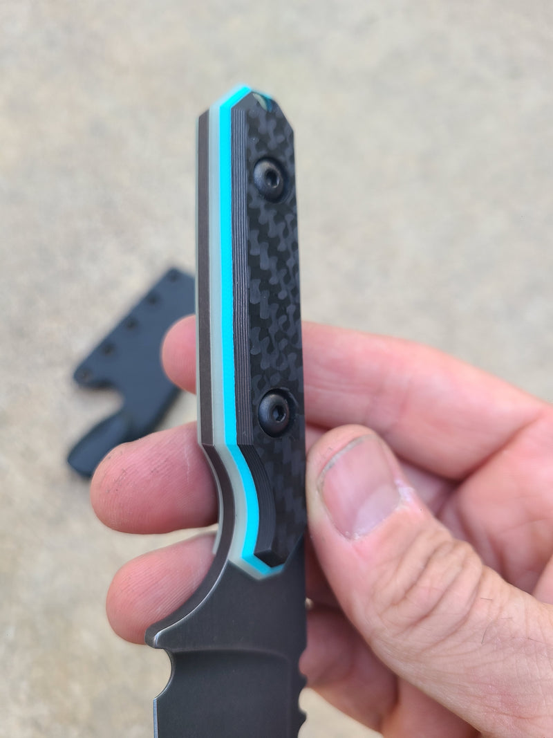Load image into Gallery viewer, 52100 Mid-Sized Bowie (Carbon Fiber w/ Turquoise Blue Glow)

